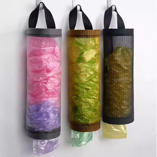 Wall mounted plastic bag organizer holding colorful plastic bags with black hanging straps