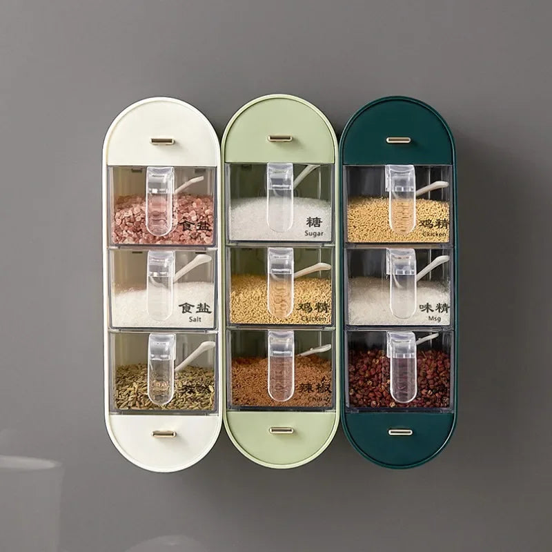 Clarify.pk wall mounted spice box with three sets of clear containers holding various spices and seasonings