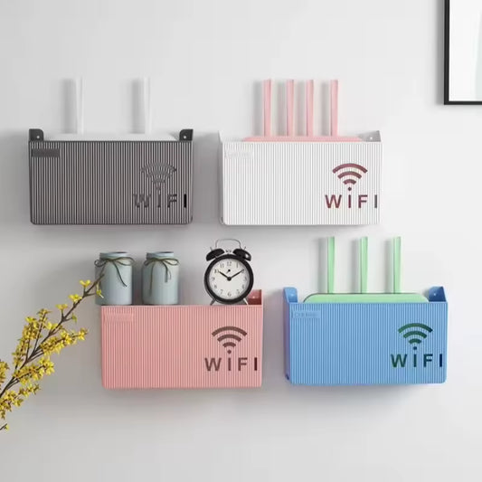 Colorful wall mounted wifi router box options in black white pink and blue organized on a wall