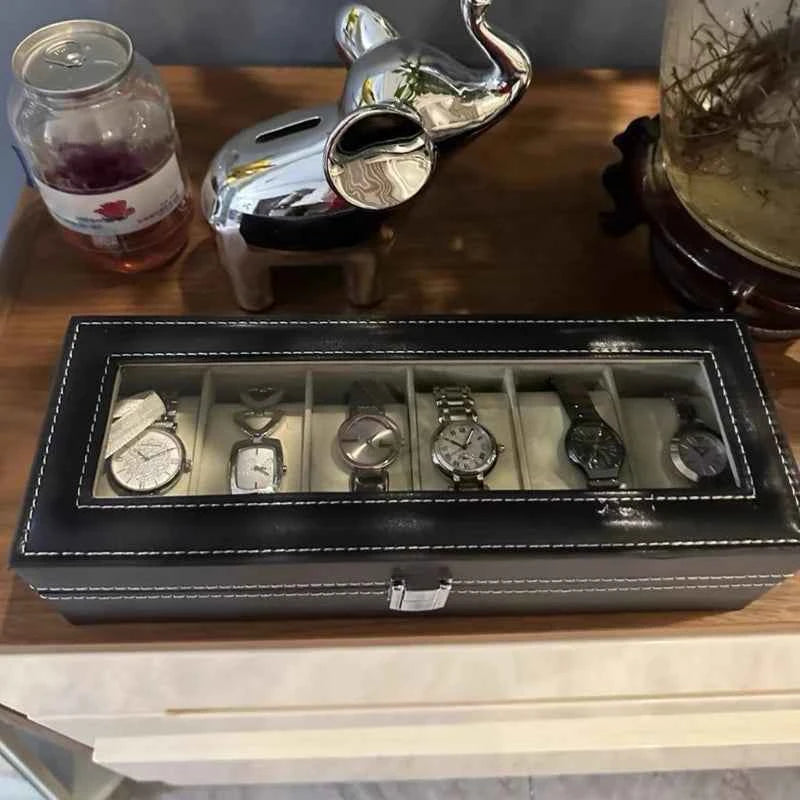 Elegant watch display case with lock featuring multiple compartments for secure storage
