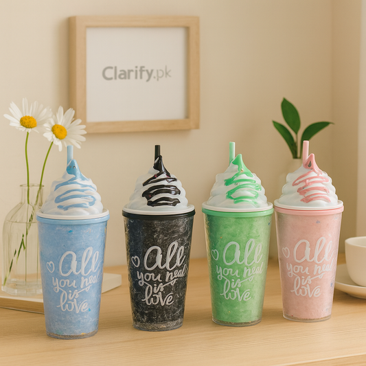 Colorful water bottle shaped cups with whipped cream tops and straws in blue black green and pink