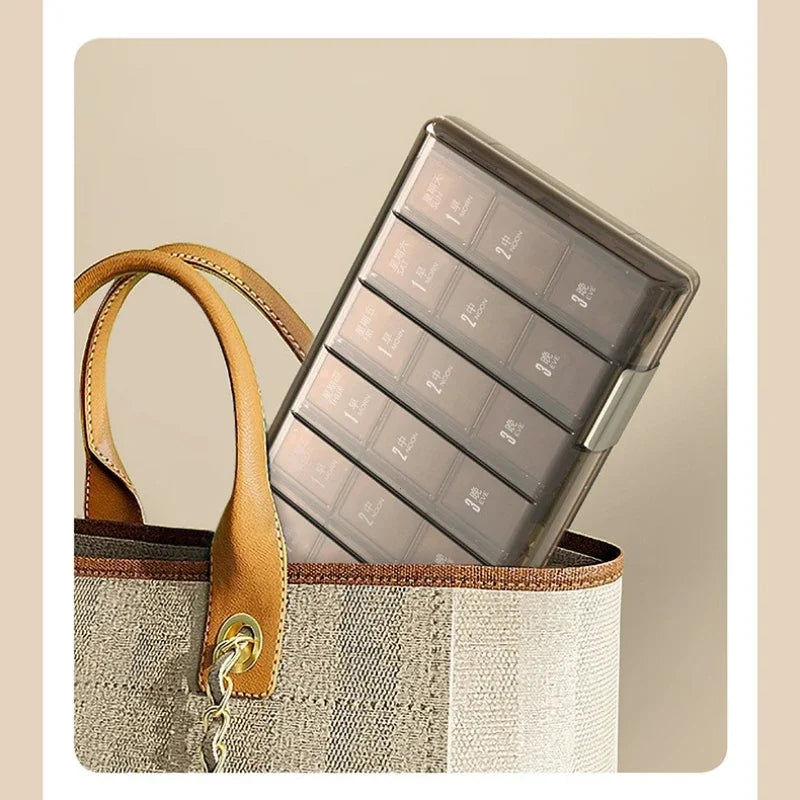 Clarify.pk weekly pill organizer box with multiple compartments inside a beige handbag