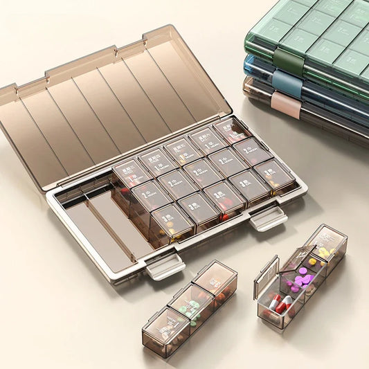 Clarify.pk weekly pill organizer box with transparent compartments and removable sections for pills