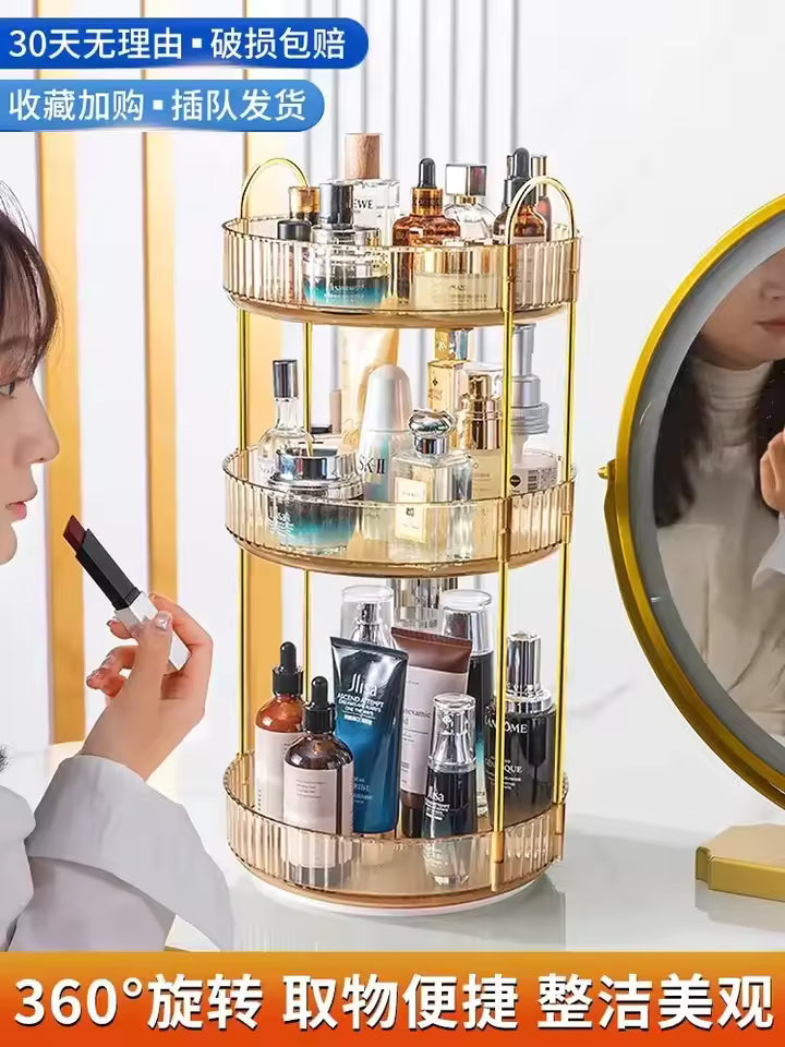 Gold metal 3 tier cosmetics organizer holding various skincare and makeup bottles on a vanity table