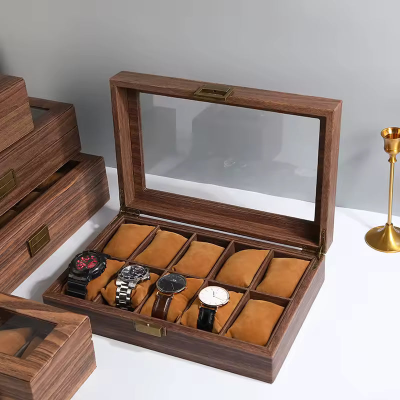 Clarify.pk wood grain leather watch box with glass lid and cushioned compartments holding four watches