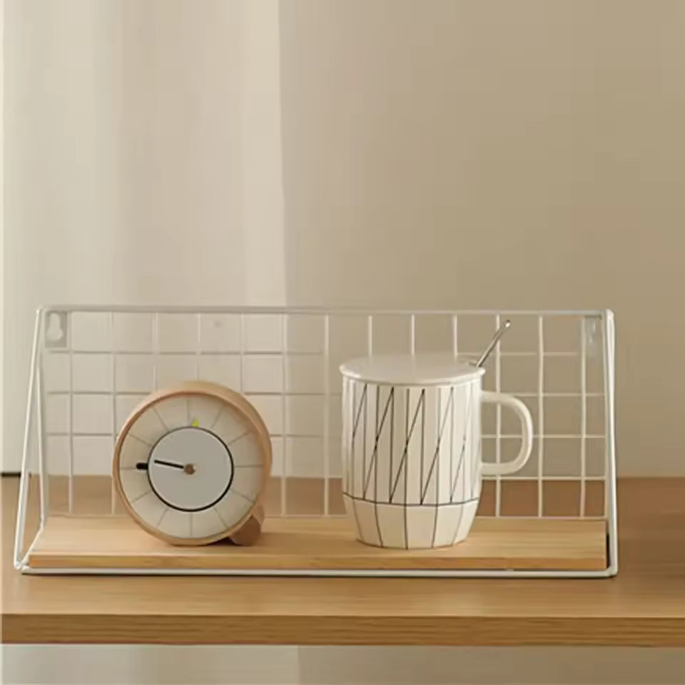 Minimalist wooden iron wall shelf with white metal frame holding a clock and ceramic mug