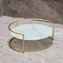 Clarify.pk wrought iron storage rack with white marble base and gold metal frame