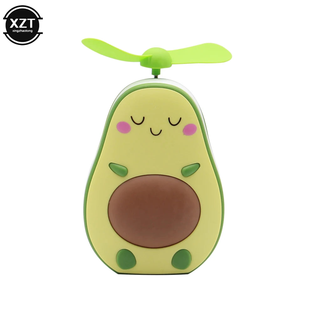 Cute avocado design portable makeup mirror fan with green blades and compact size