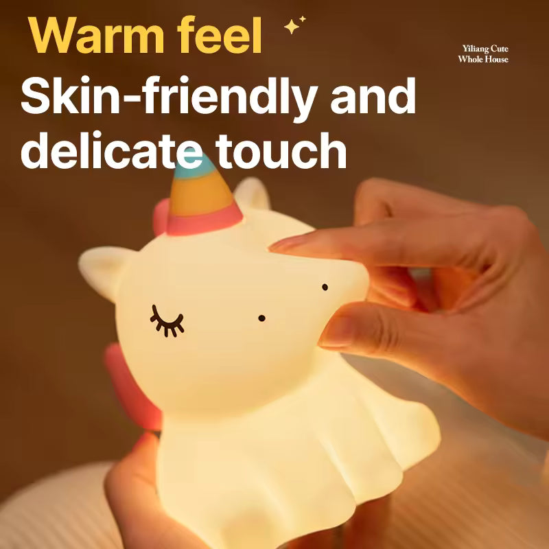 Unicorn LED night light with warm glow and skin-friendly delicate touch held by hand