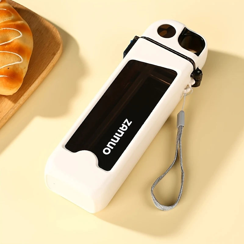 White Zammo 350ml sports water bottle with black panel and wrist strap on beige background