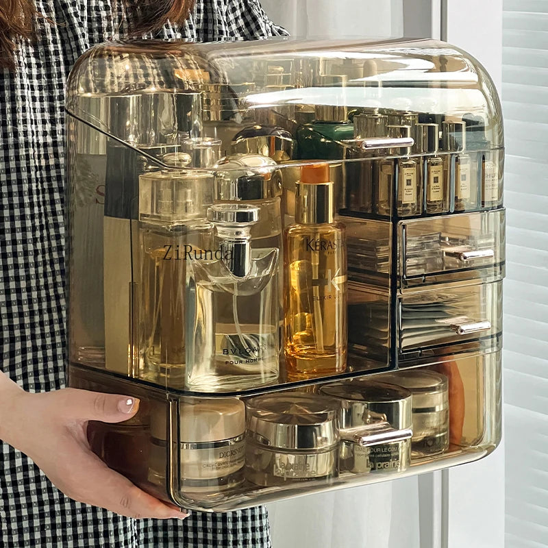 Clarify.pk acrylic cosmetics storage box with multiple compartments holding perfumes and skincare bottles