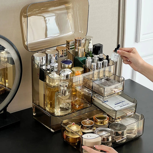 Clarify.pk acrylic cosmetics storage box holding various skincare bottles and makeup jars on black surface